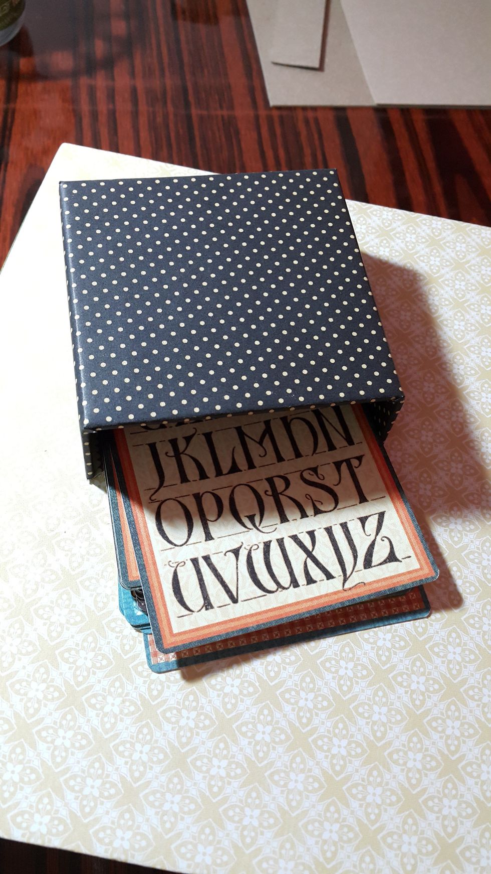 Adhere on the top of the box, its cool