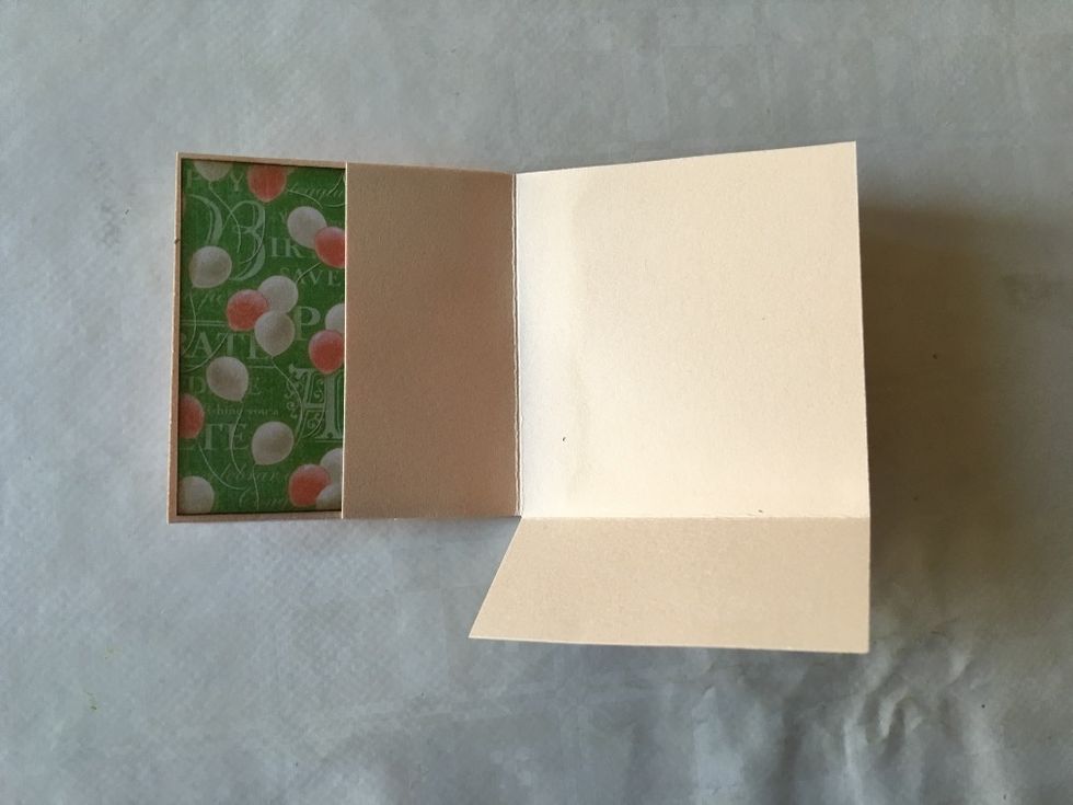 Adhere page 2 to the back of page 1, in the same manner.