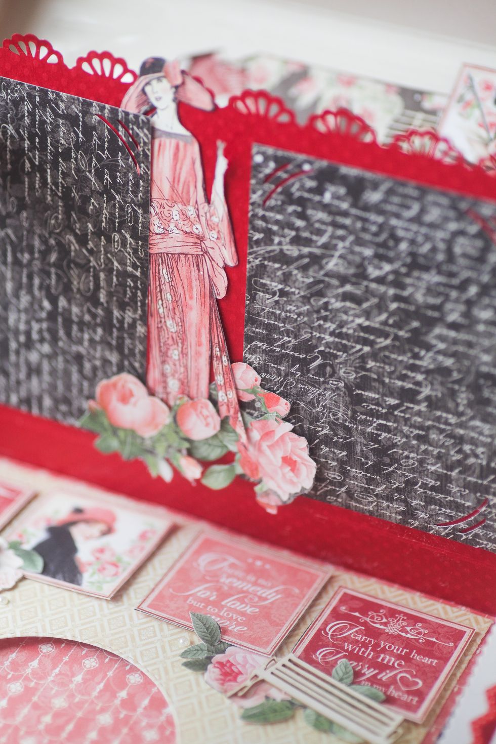 Adhere paper photo frames to the other side of the layout and embelish.