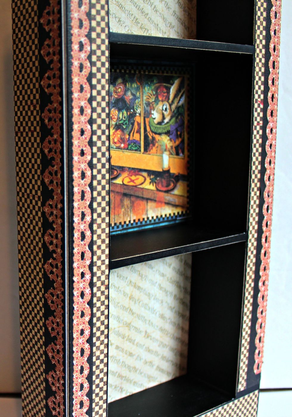 Adhere paper to sides and inside of Shadow Box. Die cut strips of pattern paper with die; adhere to Shadow Box.