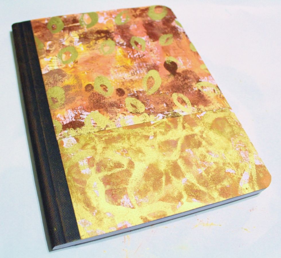 adhere papers to composition book...