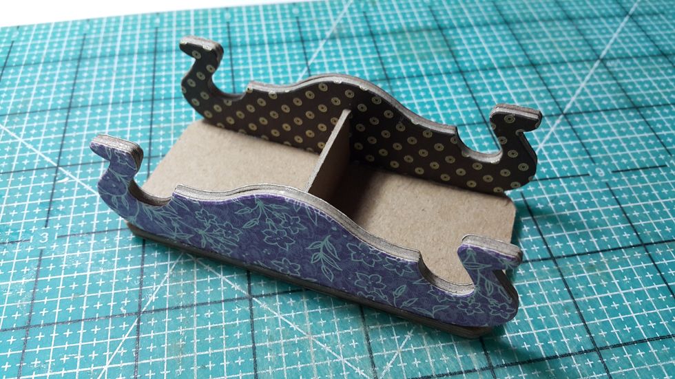 Adhere part together to form the table, use a small piece of chipboard in the middle to hold them in place.