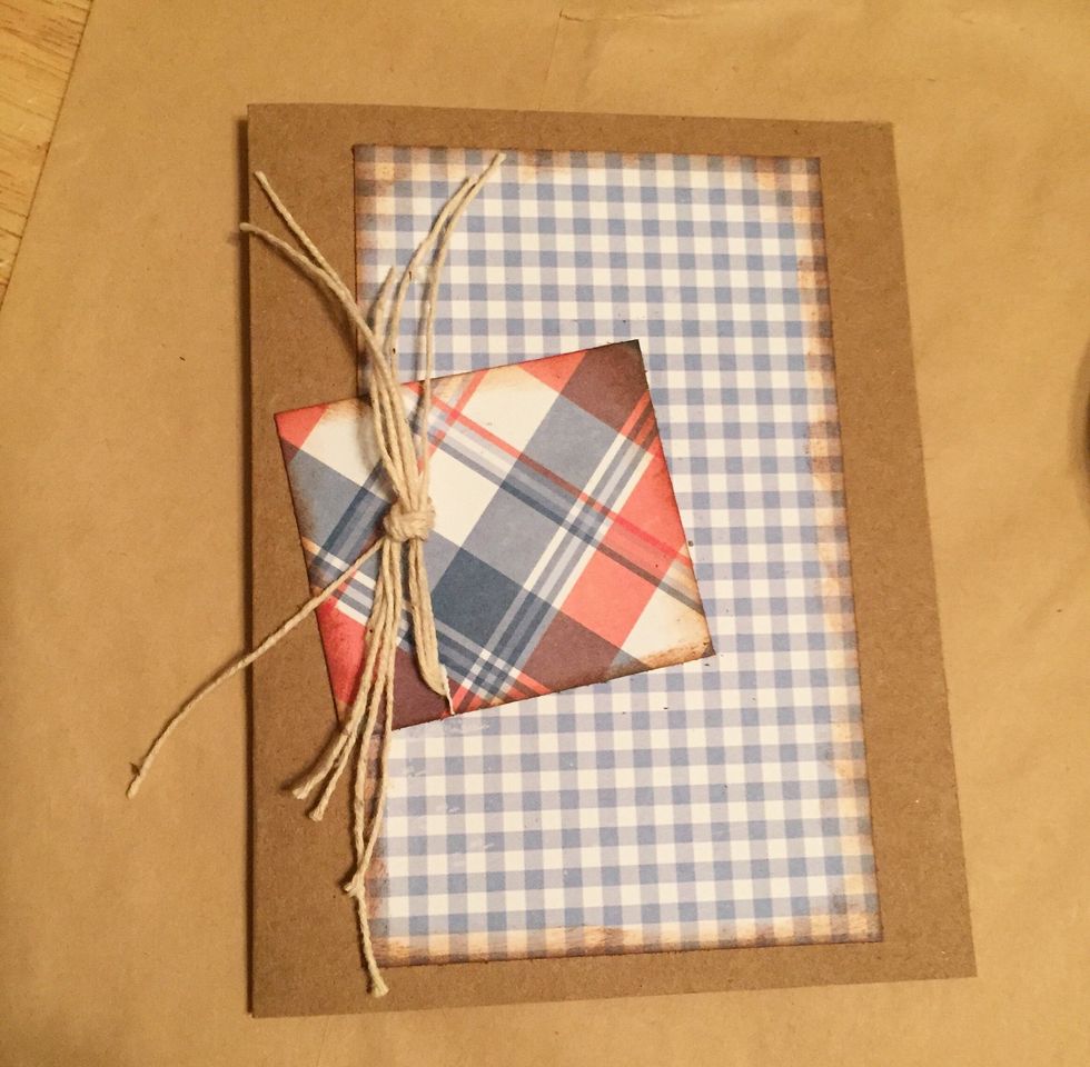 adhere plaid paper to card front at an angle