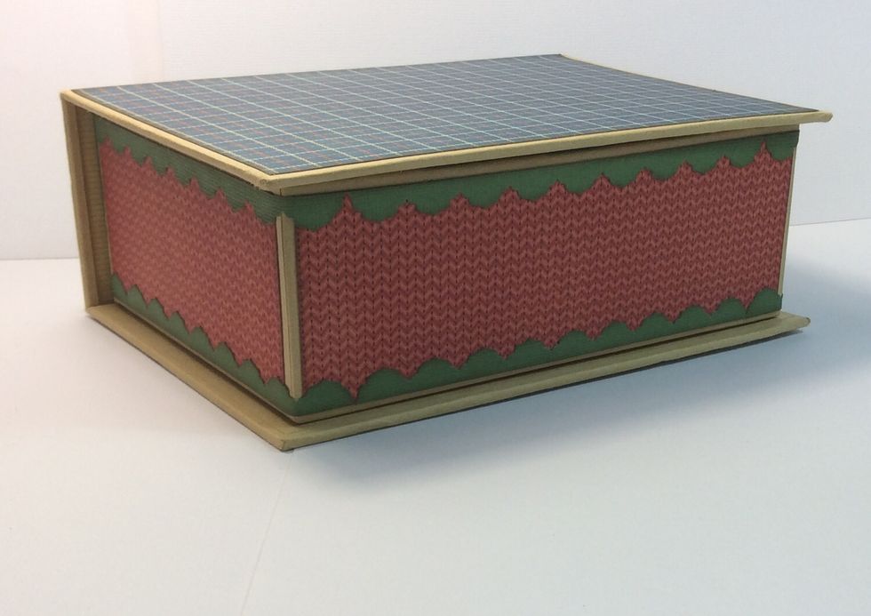 Adhere remaining border strips joining each one next to the previous. Trim if required and continue around box .