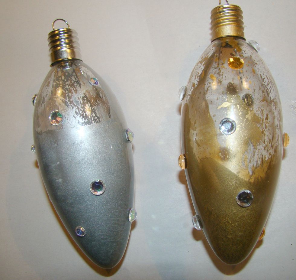 Adhere, rhinestones randomly to the outside of your ornament.