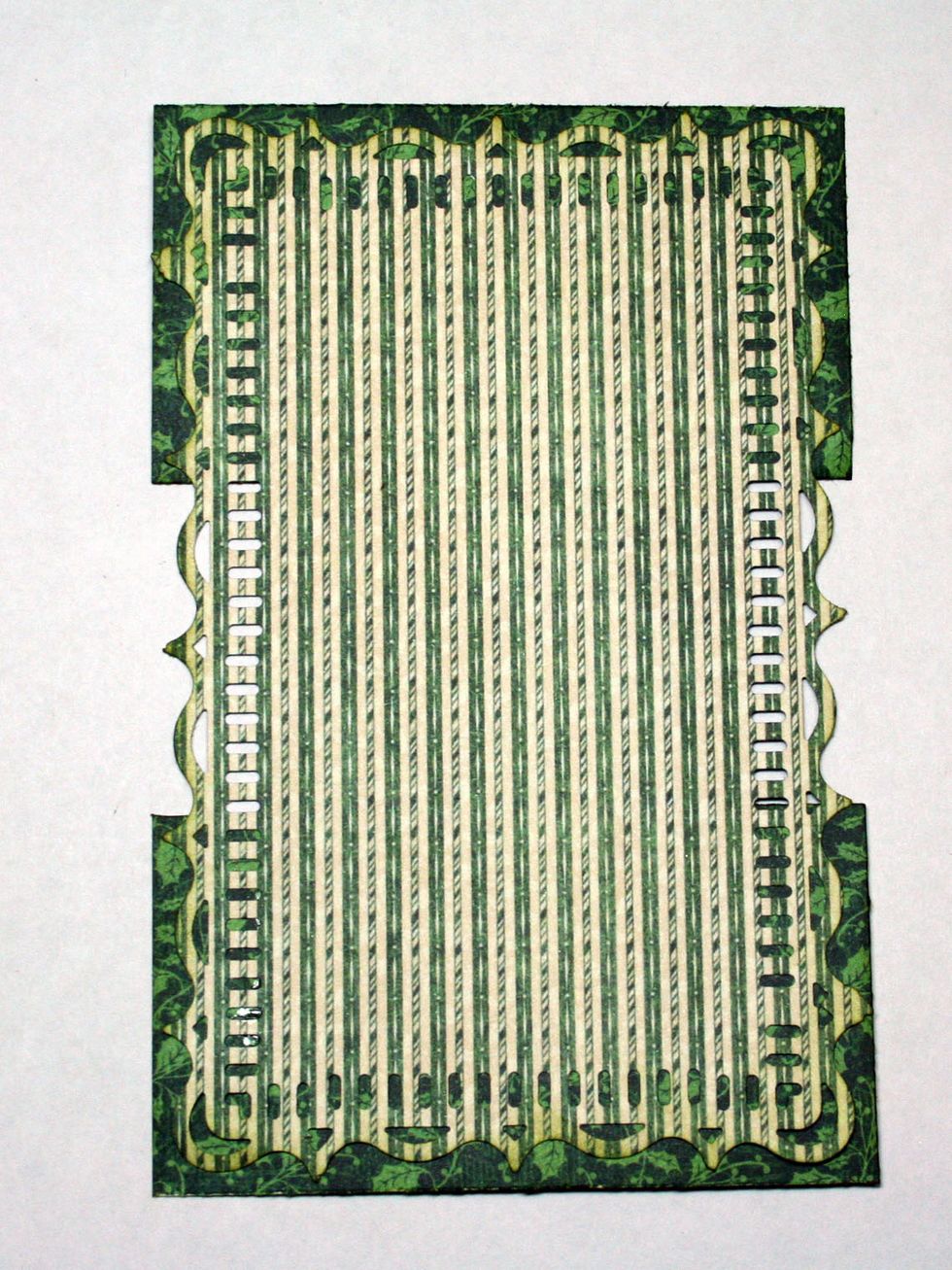 Adhere Scrooge and Marley rectangles to the top & bottom of the striped frame as shown.