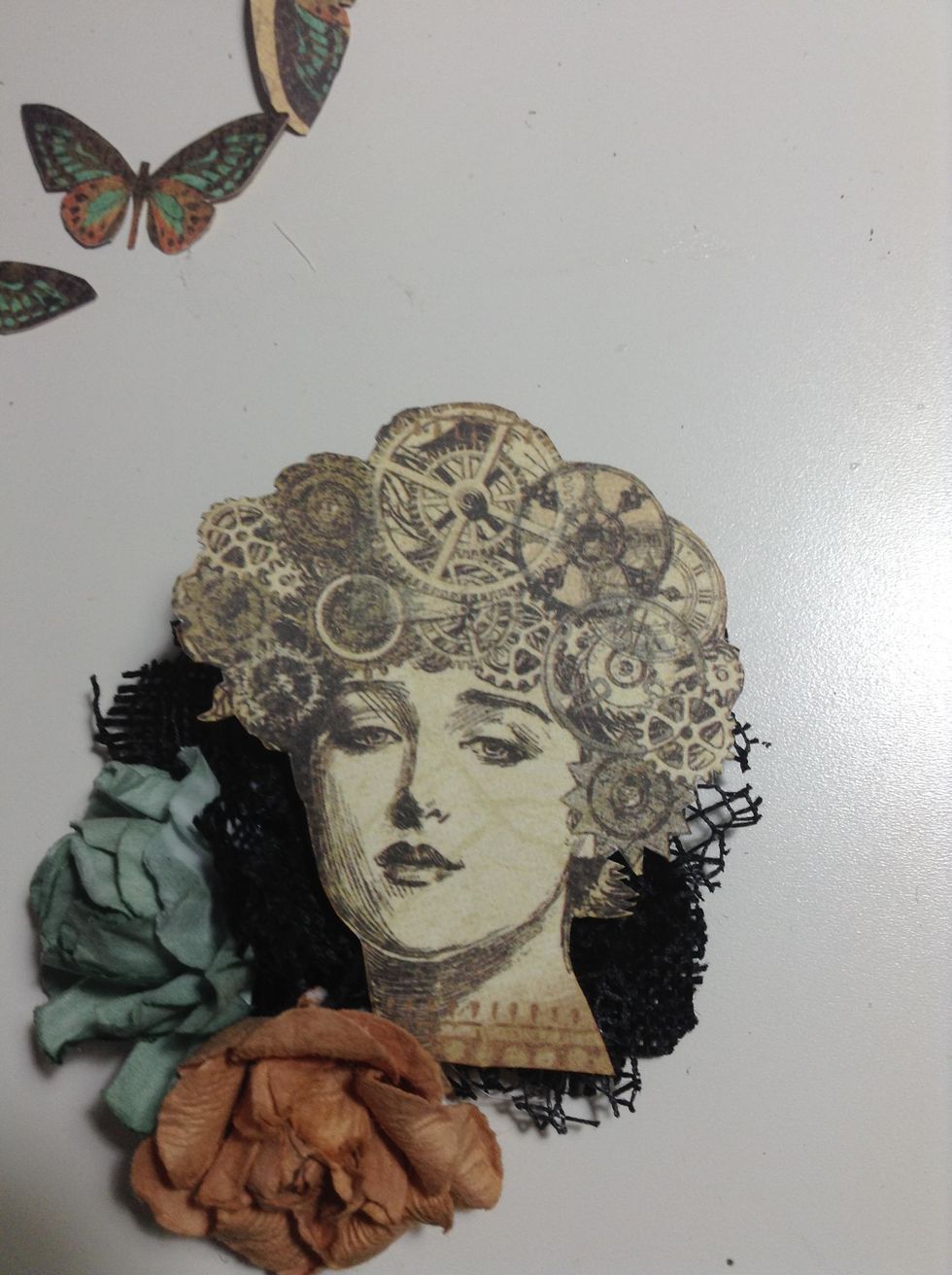 Adhere  some flowers piece in this place, as shown.