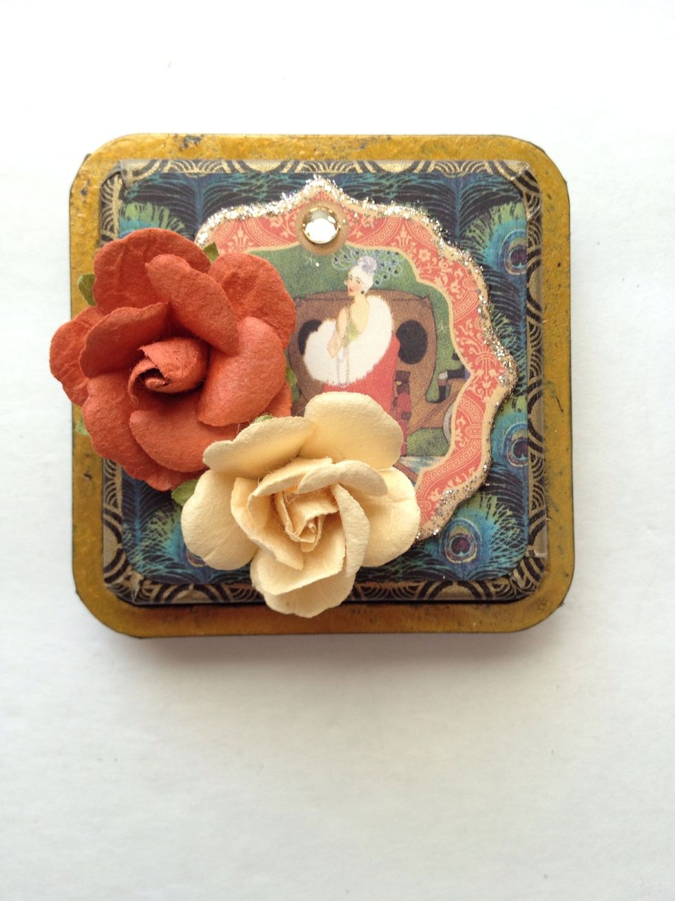 Adhere some paper flowers, like these ones from Michael's.