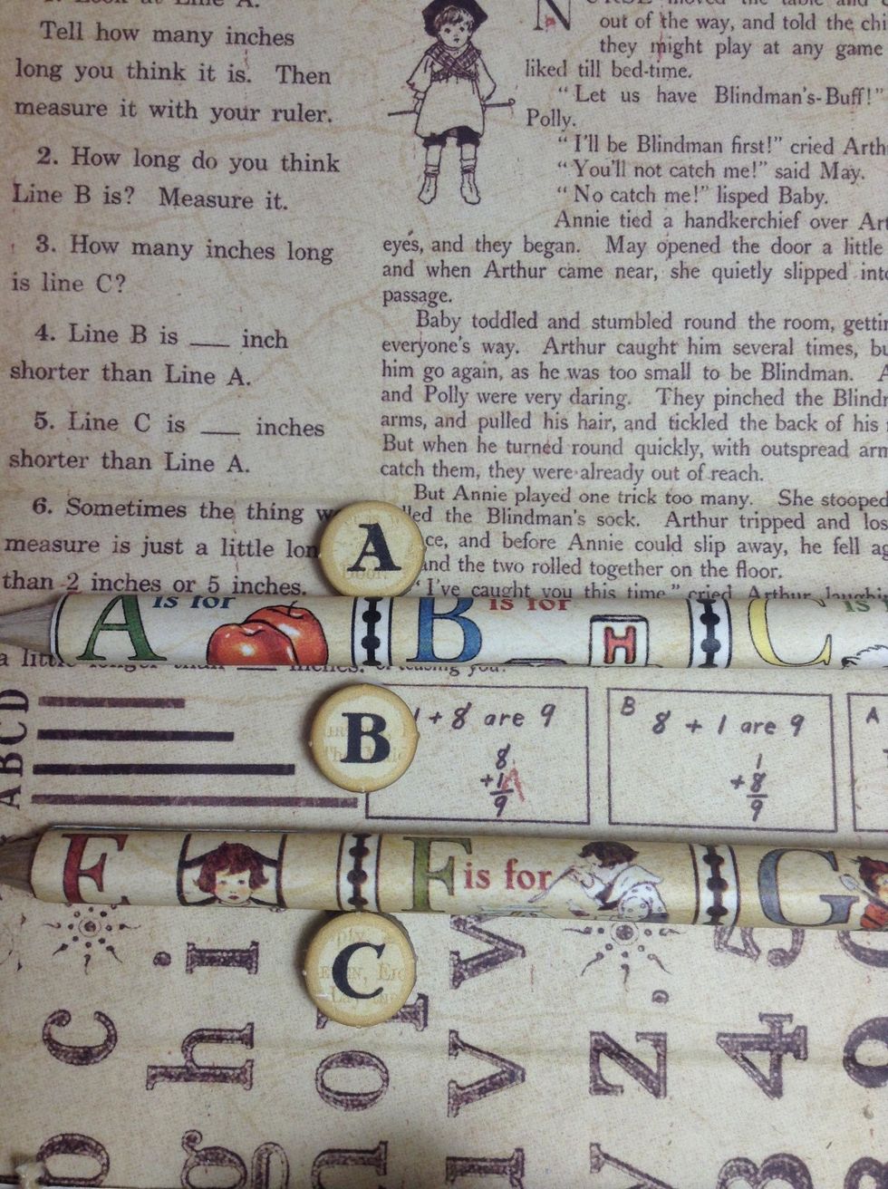 Adhere the 3D buttons as shown..in the spine..