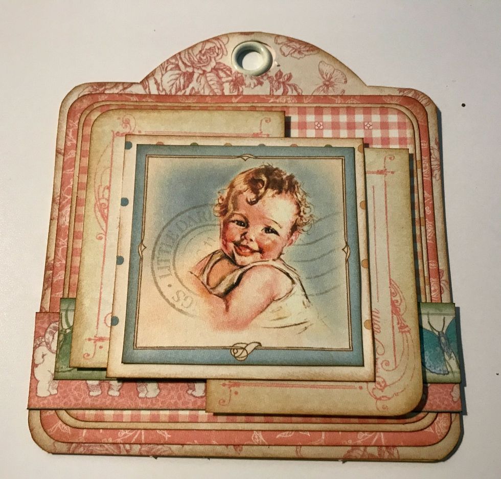 Adhere the baby image to the polka dot square. Adhere the polka dot square in the middle of the For Baby tags.