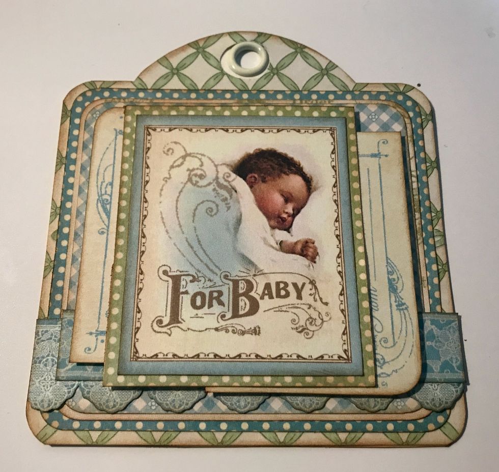 Adhere the baby image to the polka dot square. Adhere the polka dot square in the middle of the For Baby tags.