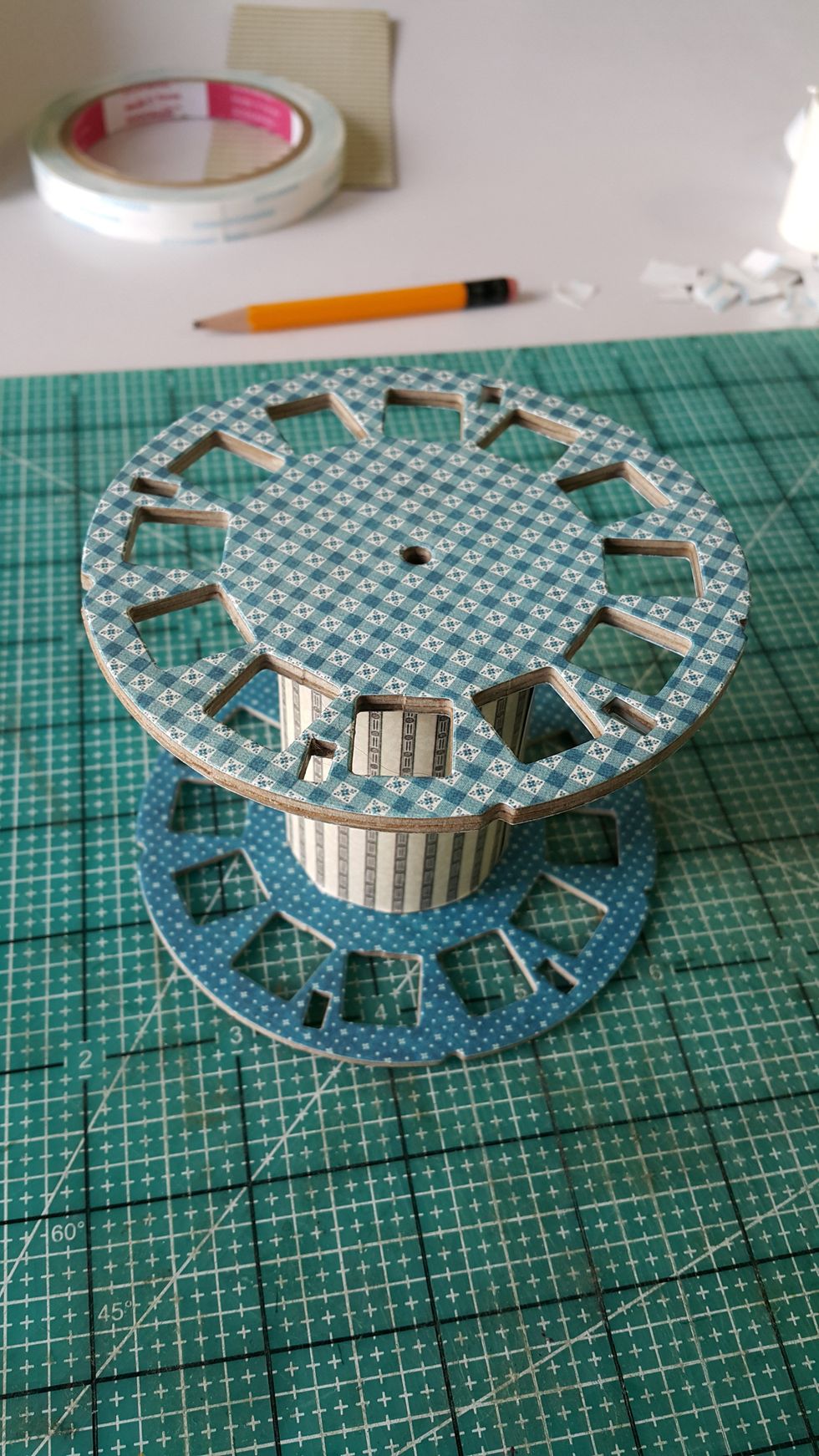 Adhere the base and the top