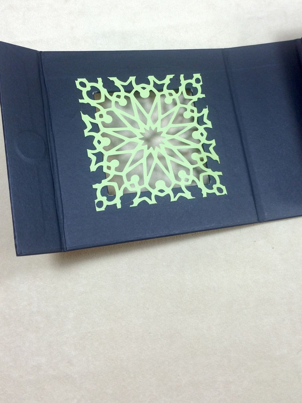 Adhere the cut square to the inside flap of the box as shown.