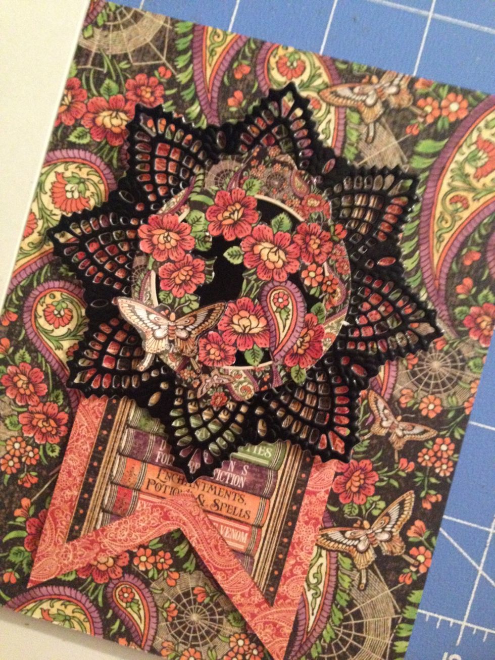 Adhere the doily to the top of the card as shown.