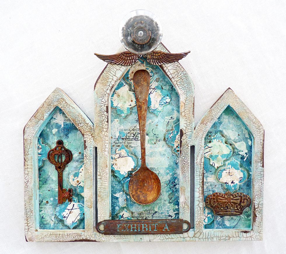 Adhere the elements onto the frames using matte medium.