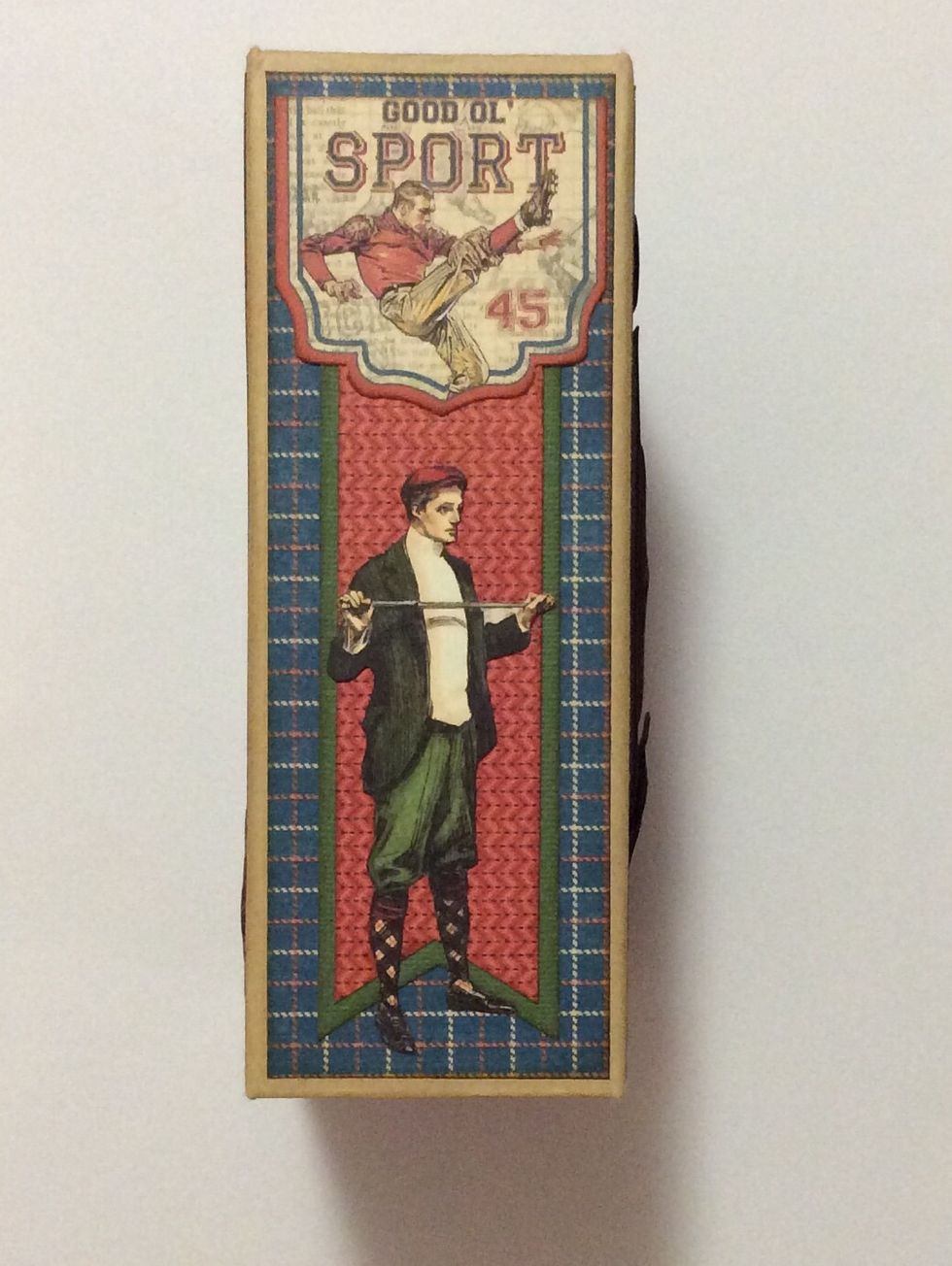 Adhere the fussy cut image shown to the spine of the box.