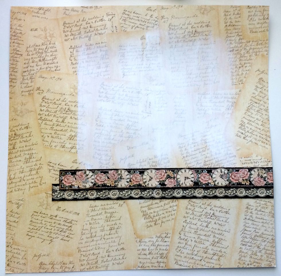 Adhere the lace border 3" from the bottom of the diary paper and right to the edge of the right of the paper. Adhere the clock border a 1/4" about the lace border and right to the edge.