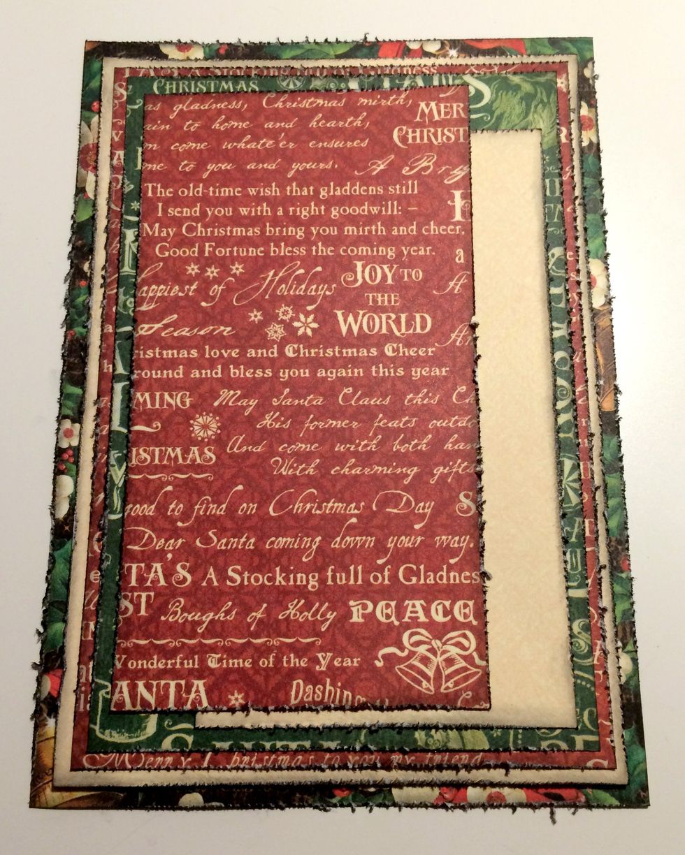 Adhere the medium piece of cream paper 1/4" from the right and bottom of the green word paper. Adhere the medium red word paper 1/4" from the  top and left of the green word paper.