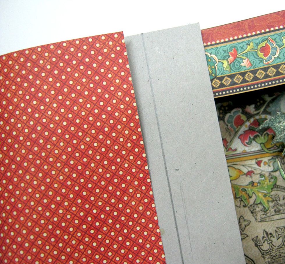 Adhere the other edge of paper to 4"x8" chipboard covering 2" on left side of chipboard. repeat with other side. Repeat on other side.