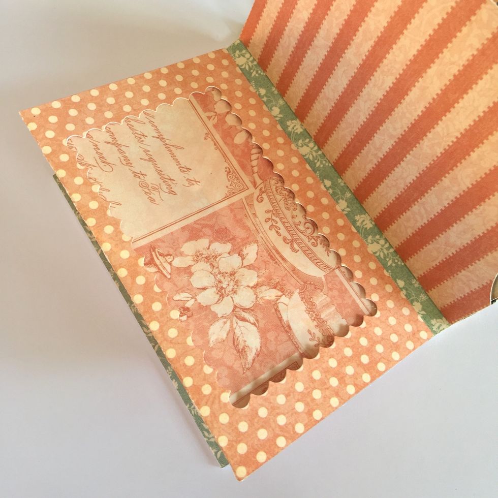 Adhere the page to the spine.