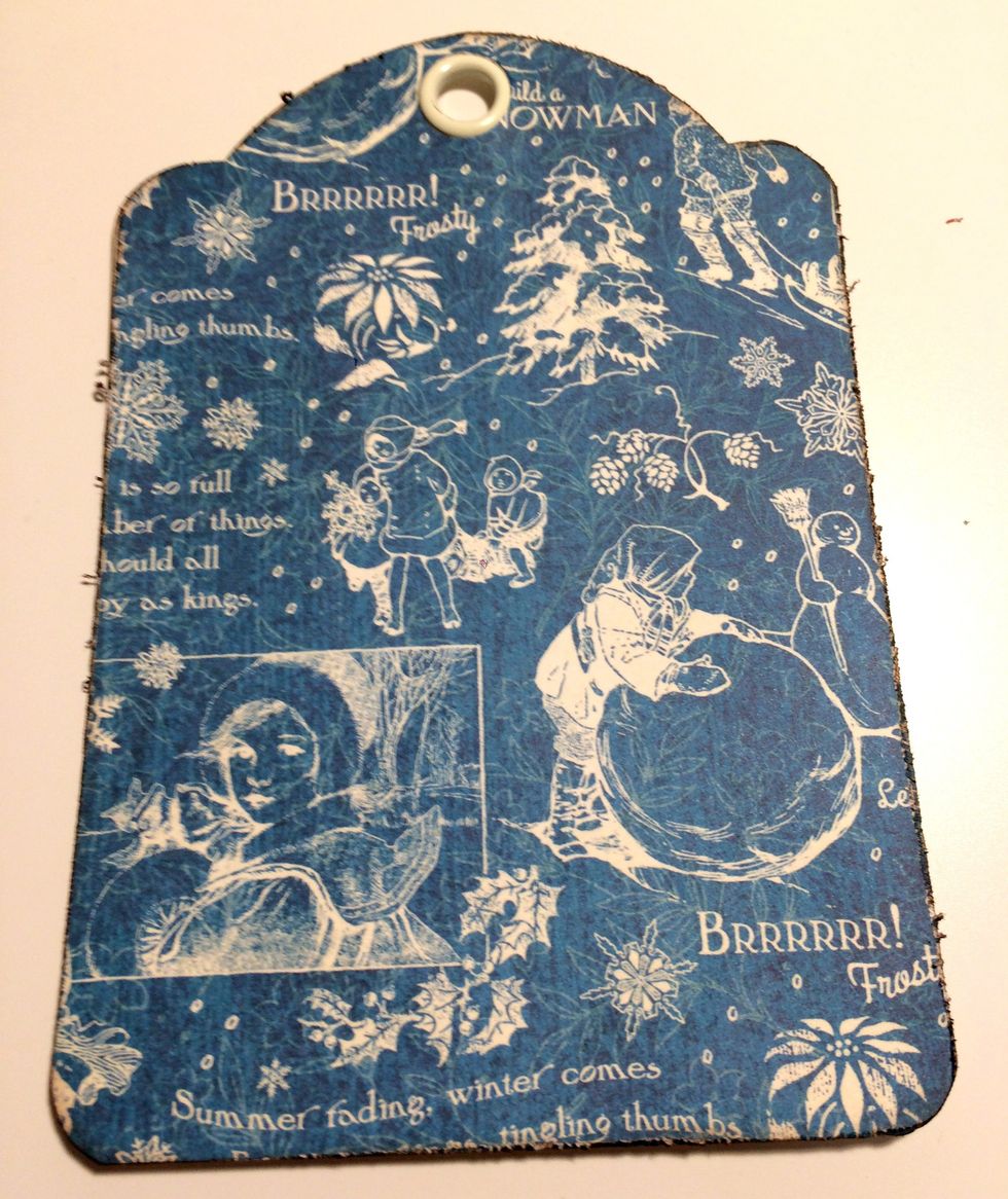 Adhere the patterned paper tag to the Ivory tag.