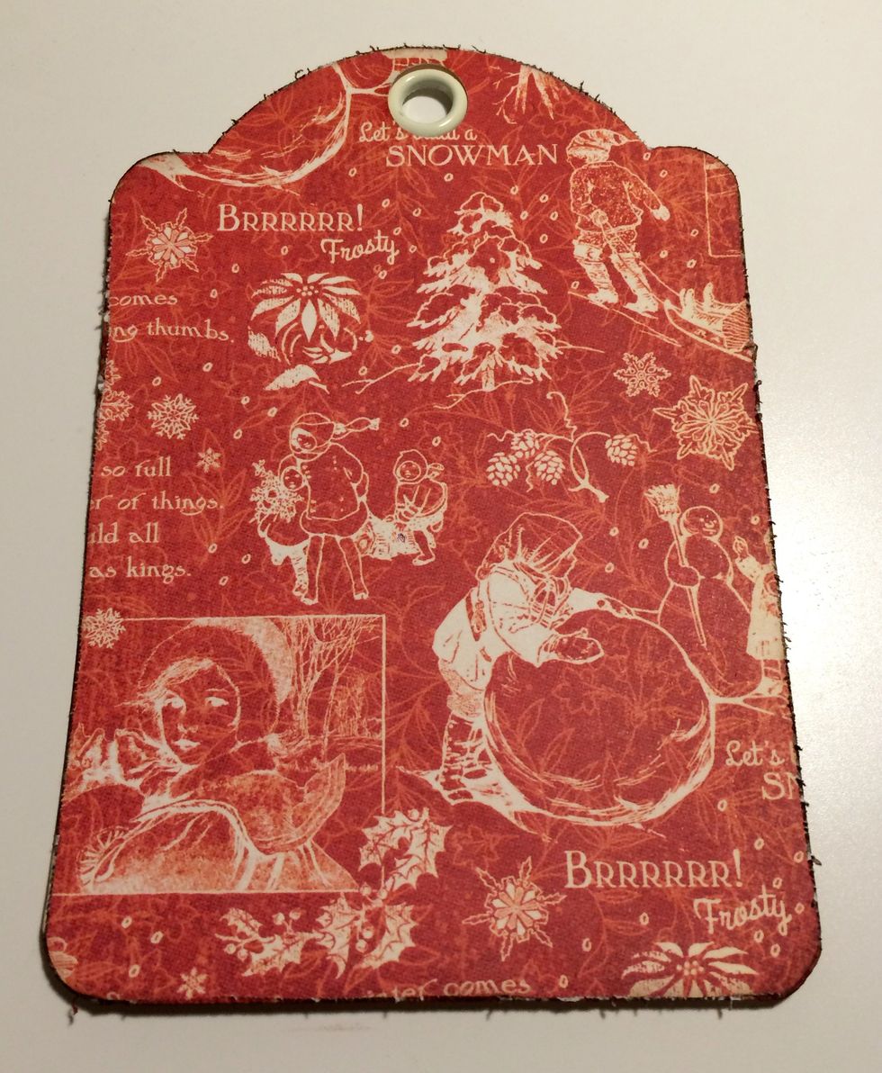 Adhere the patterned paper tag to the Ivory tag.