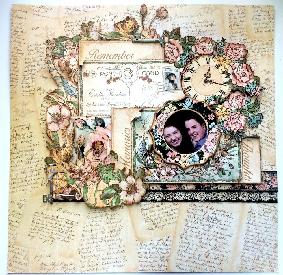 Adhere the photo to the top middle of the decorative card. Adhere the floral frame overtop of the photo, just showing the faces in the picture. Your layout is now complete!