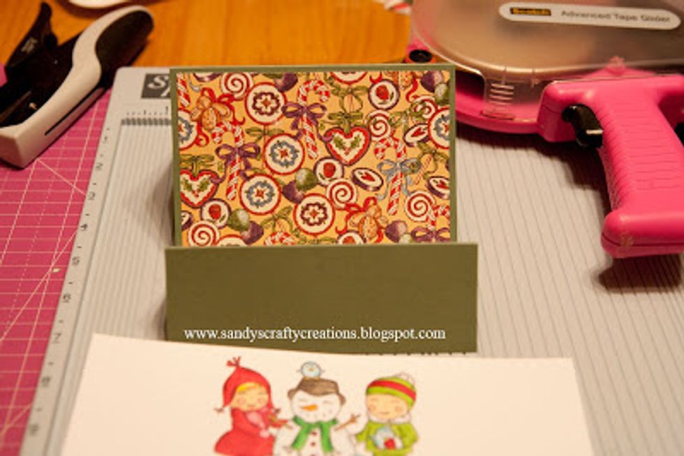 Adhere the printed paper with glue or tape runner to the card base as shown.