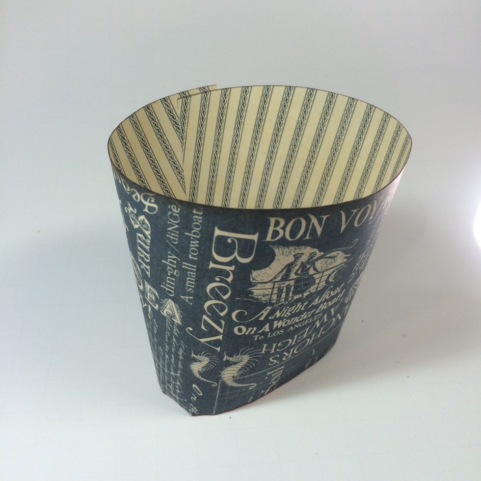 Adhere the right edge overlapping the left to finish off the tote shape.