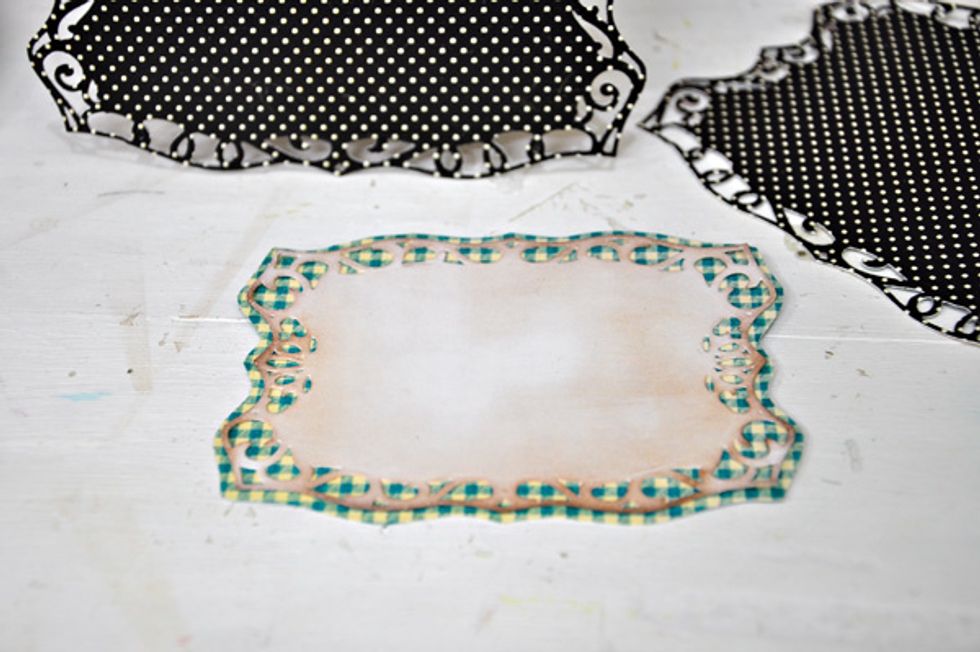 Adhere the smallest die cut paper onto another patterned paper for contrast. I just eyeballed the shape of the patterned paper based on the white die cut paper.