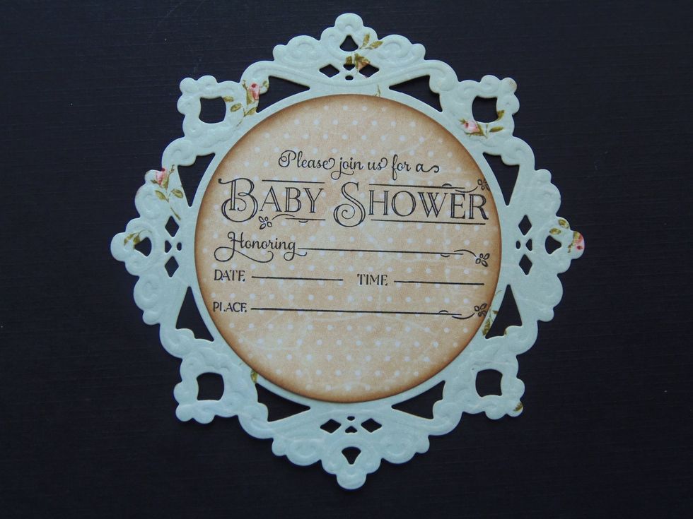 Adhere the stamped circle to the center of the big doily.