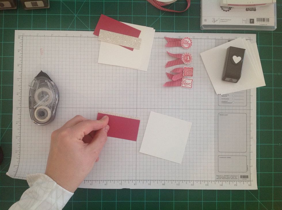 Adhere the strip of Silver Glimmer Paper to the cardstock, revealing as much or as little as you want.