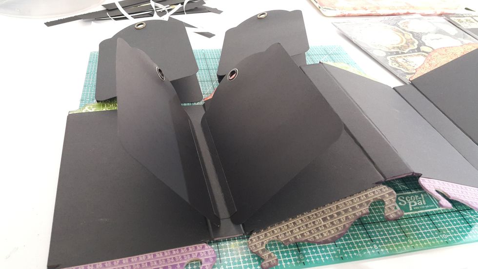 Adhere the tag flips on the screen panels, you can now start decorating with your favorite Graphic 45 papers and Staples