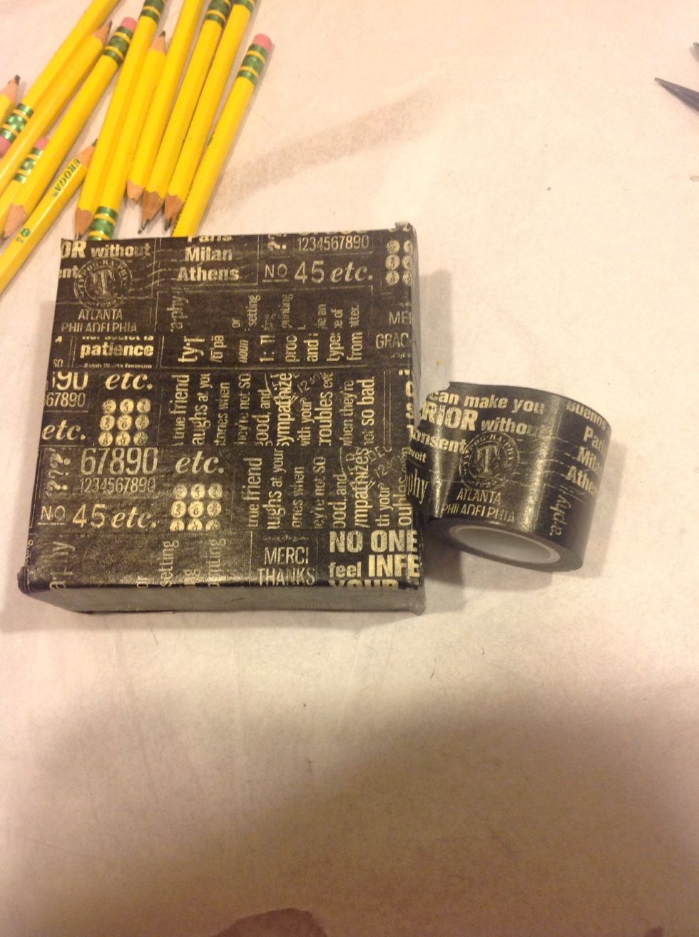 Adhere washi tape all over canvas. Use a bone folder to ensure good contact.