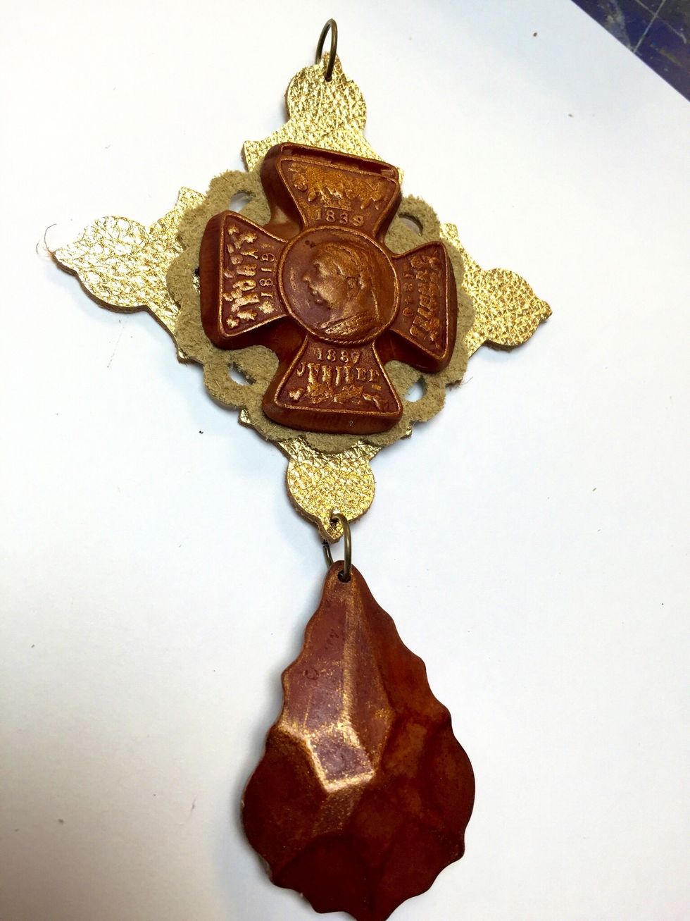 Adhere Your Relic to the leather using 3D Gloss gel