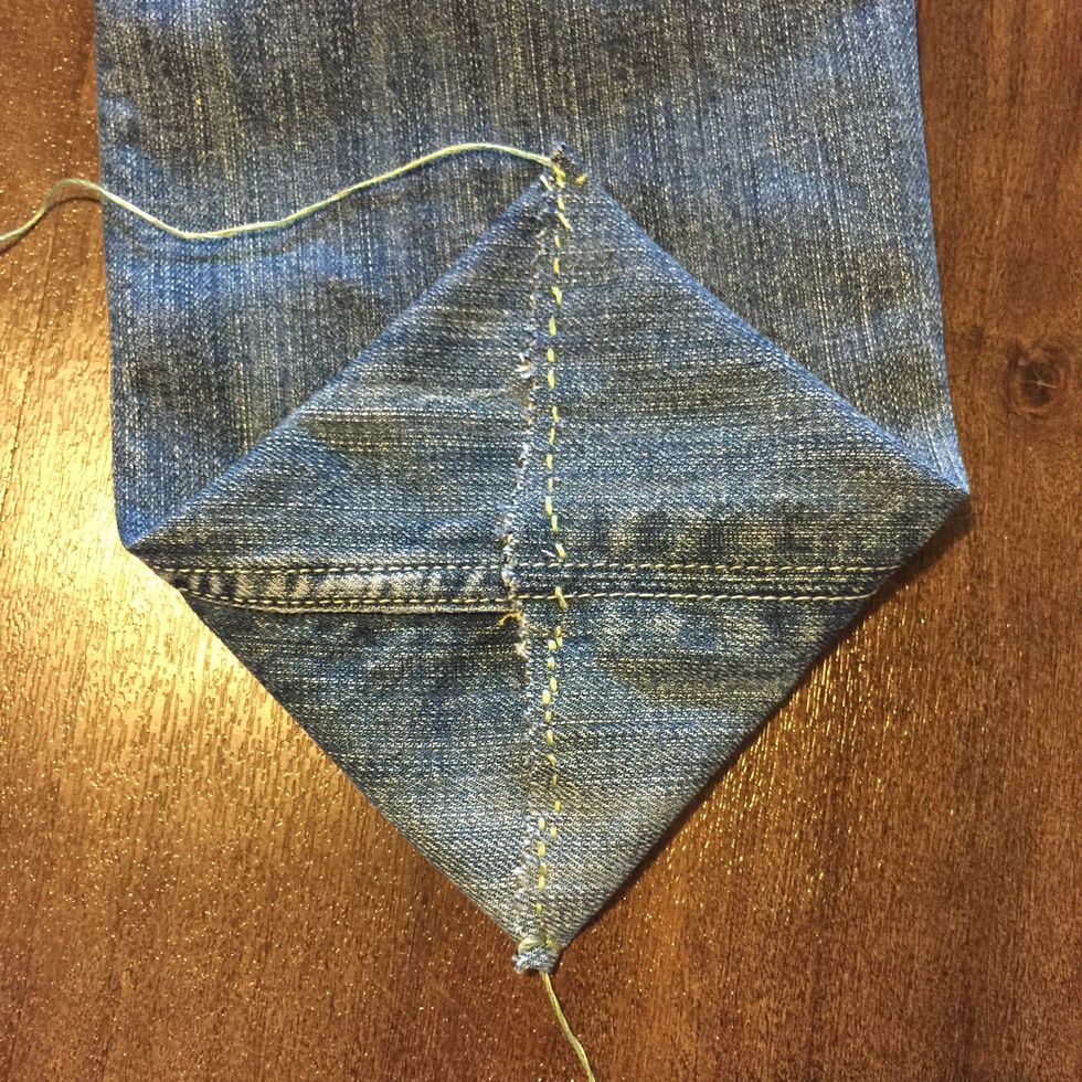 Adjoin the sides by sewing across. Make sure knots are tied tight and secure and the sewing is very secure. Doesn't matter if its neat - it simply needs to be secure so it can hold weight in the bag.