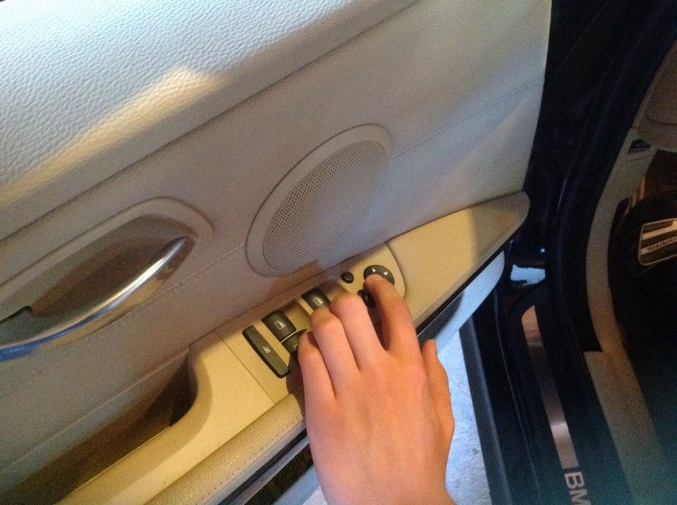 Adjust side mirrors to see out side of car