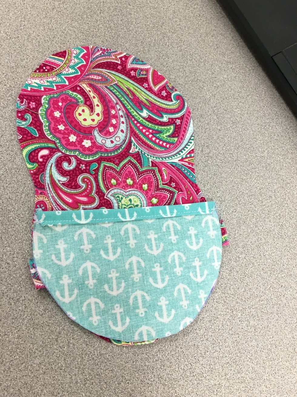 Adjust the location of the rectangle (shift down), and place the pocket 1/2 circle "wrong side up" on top of the closure rectangle. The edge of the rectangle and top of the pocket should be parallel.