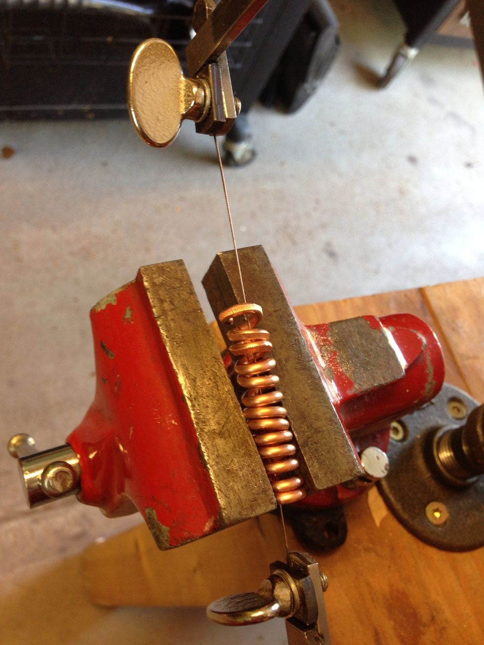 Adjust where the vice is gripping frequently, so you are not compressing what you are sawing.