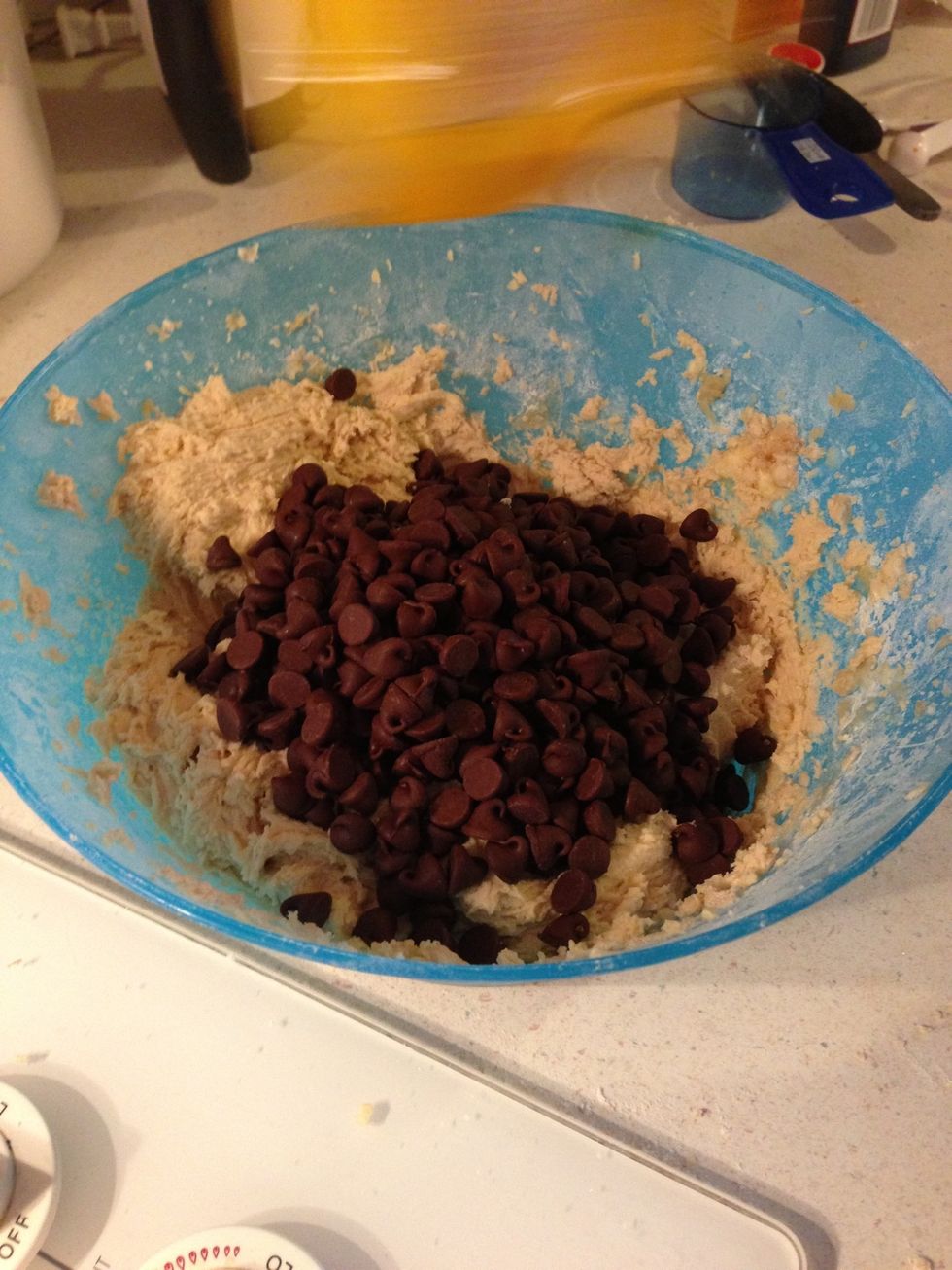 Ads chocolate chips. Nuts are optional if you want them.