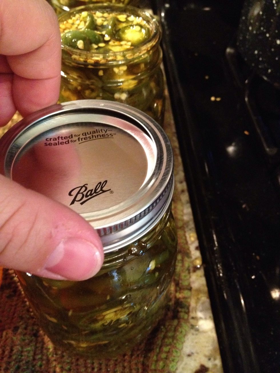 Affix the two piece lids onto the jars to finger tip tightness.