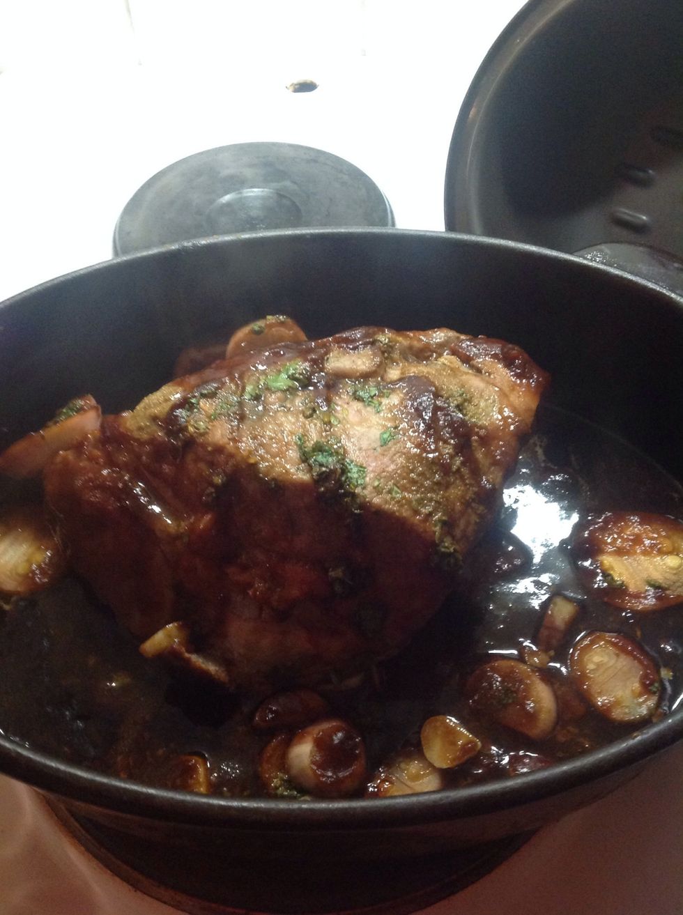 After 1 hour in the oven, push down the onions from the top of the steak to the bottom of the pot.