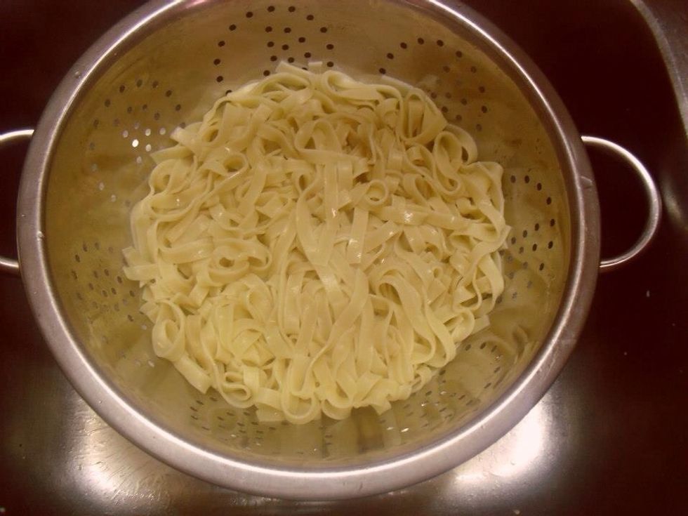 After 10 min take the fettuccine and spread it with cold water