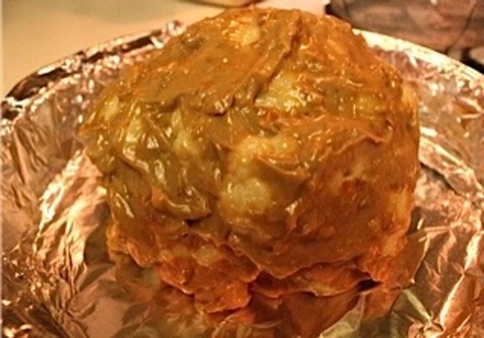 After 10 mins drain the cauliflower and cool it for 10 mins. The cooler the better. Cover entire cauliflower with mix.