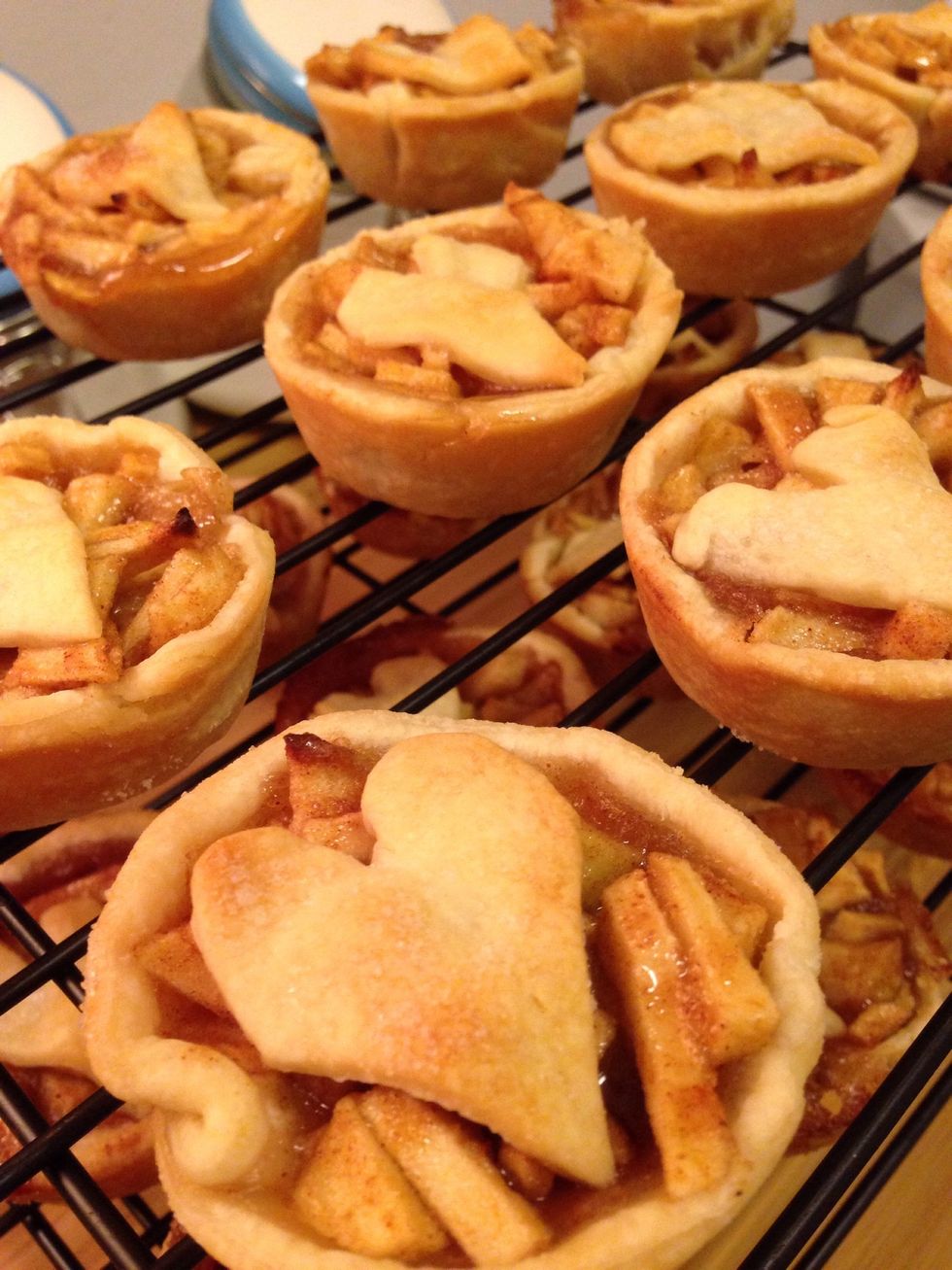 After 10 minutes of cooling, run a knife around each pie, carefully remove, and place on rack to cool completely.