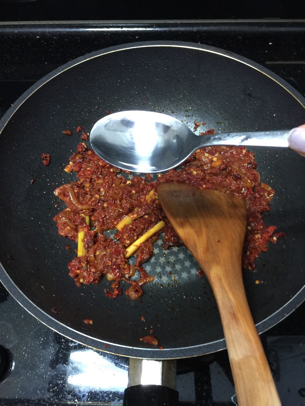 After 10 minutes of frying the paste, add some water about 1/3 cup.