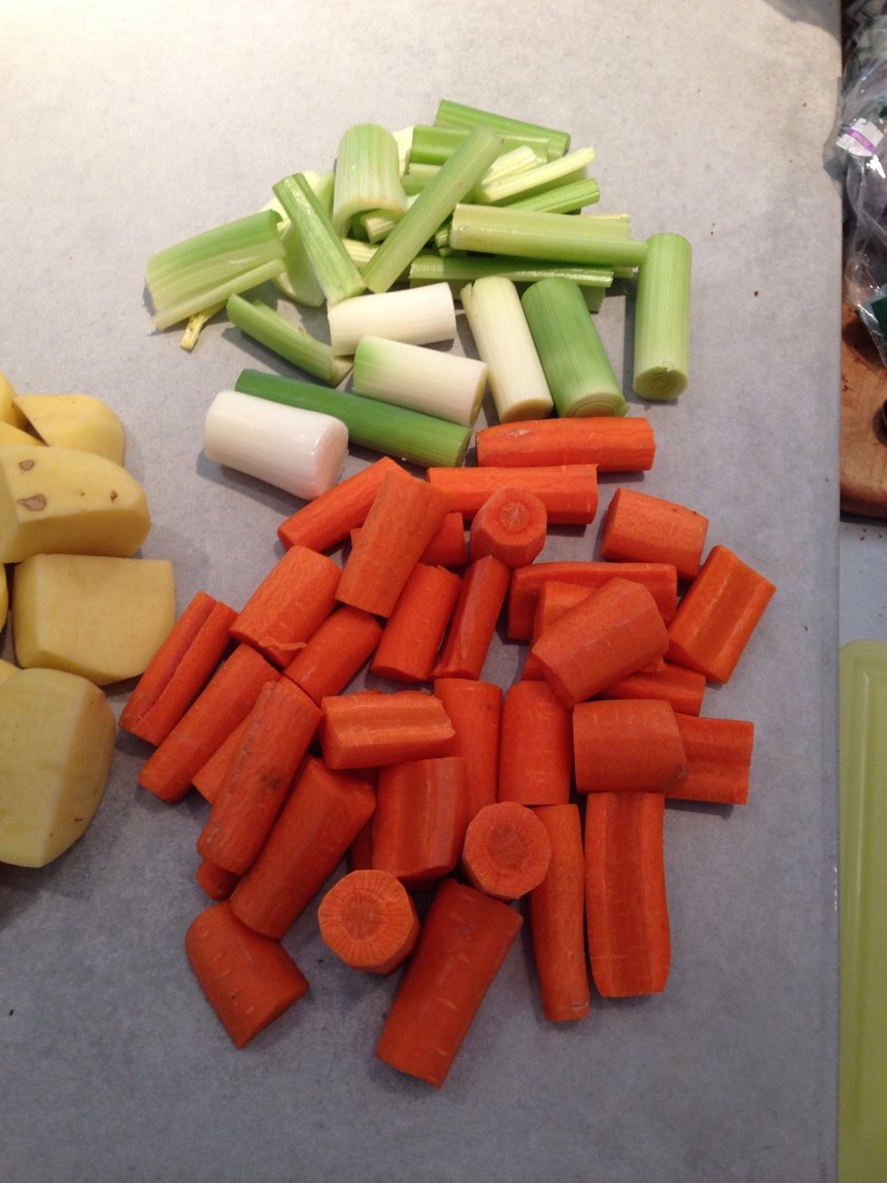 After 10 minutes or so, it's time for celery, leeks and carrots to take the dive