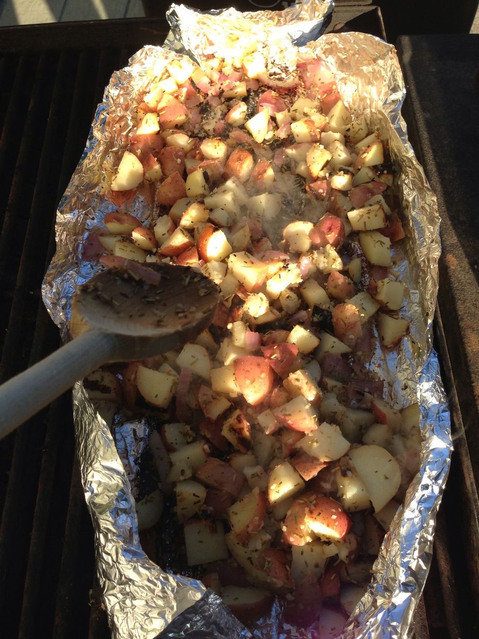 After 10 minutes, stir the potatoes and be careful not to burn yourself . After you are finished, cover it up and continue doing this every 10 minutes for 30 more mins or until the potatoes are soft.