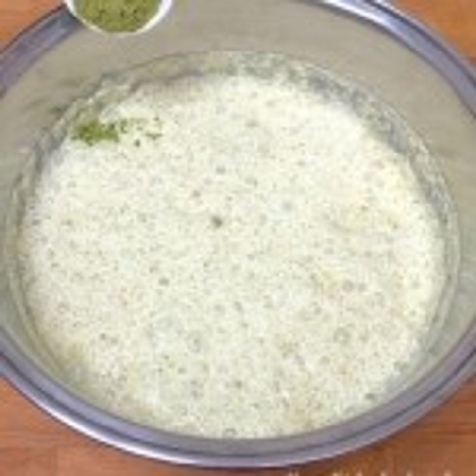 After 11 hours, add the green tea powder into the plain batter and stir to mix well.