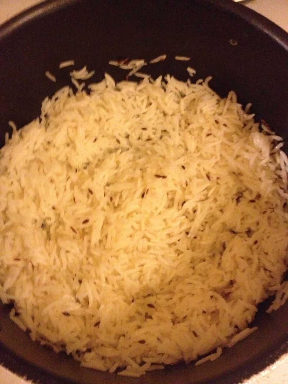 After 12 minutes, uncover and see if the water has been fully absorbed. If not, you can cook for 2-3 more minutes. Fluff and serve with Indian curries!